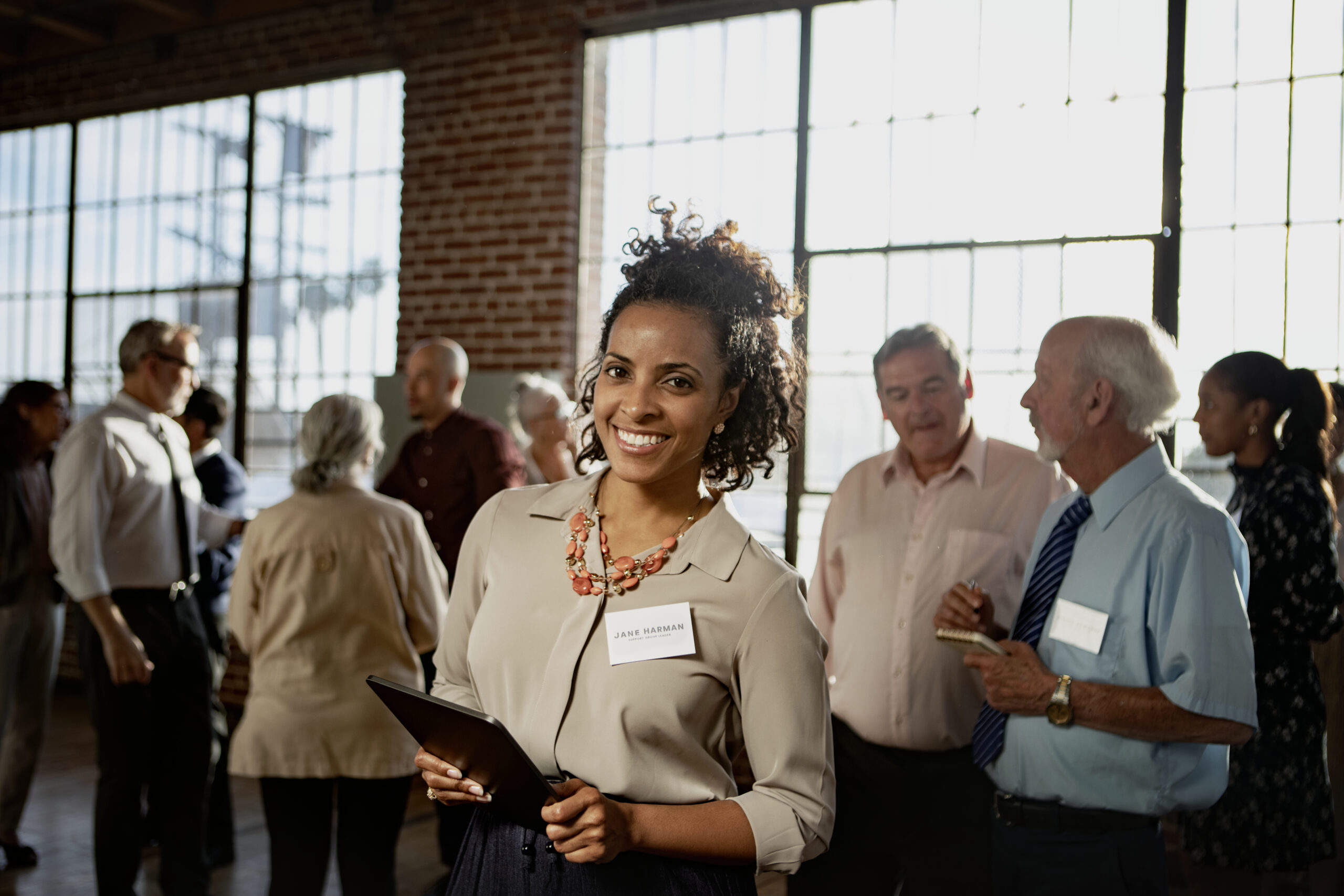 Sociable sales professionals at an event